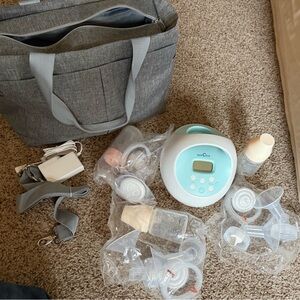Spectra 1 Breast pump unused brand new items in bag